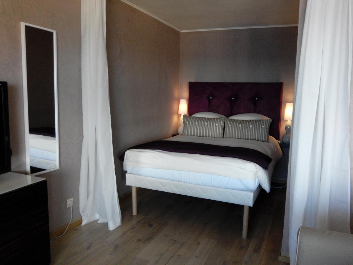 בוסוליי Monaco Hilltop Suites חדר תמונה